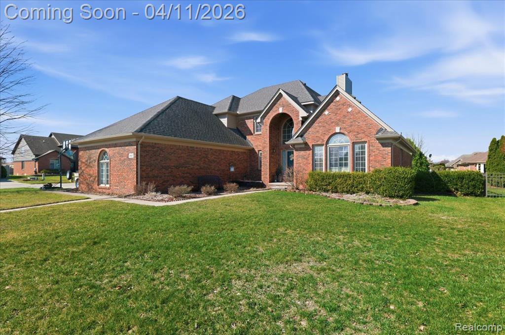 48017 Lincoln Drive, Macomb, MI 48044 — front exterior