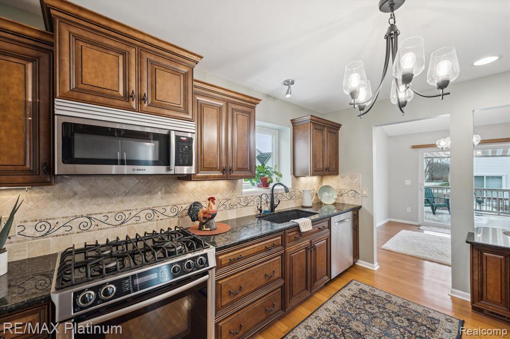 585 Snowfall Court, Howell, MI 48843 — Photo 11