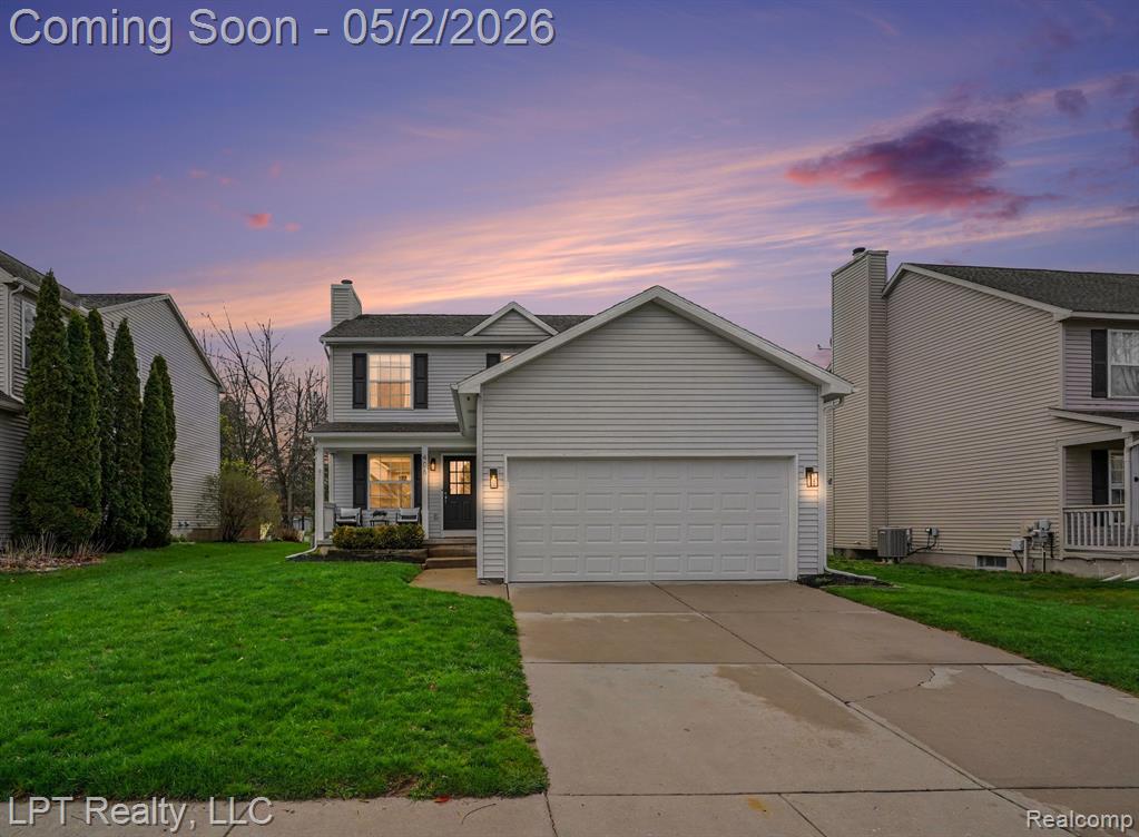 406 Mill Pond Drive, Fenton, MI 48430 — front exterior
