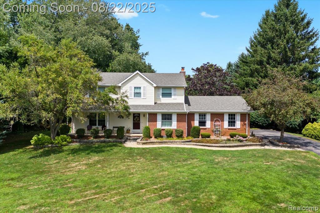 9209 Placid Way, Howell, MI 48843 — front exterior
