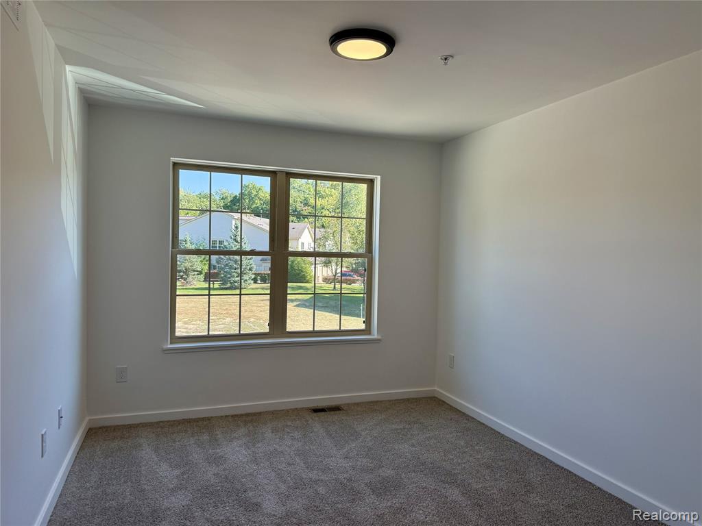 435 Village Drive, Walled Lake, MI 48390 — Photo 22