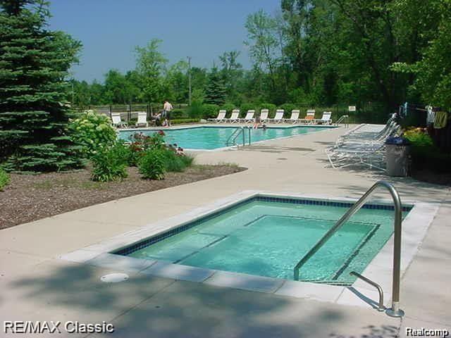 612 Pointe Drive, Walled Lake, MI 48390 — Photo 24