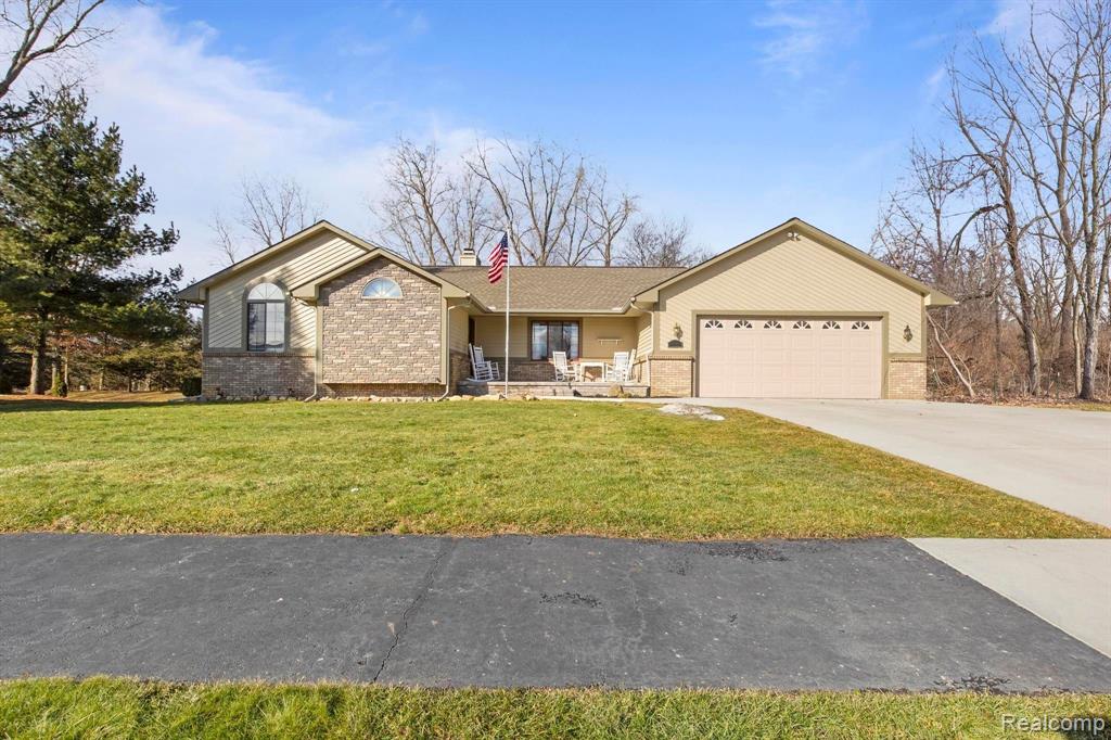 4025 PRESIDENTIAL Way, Highland, MI 48356 — front exterior