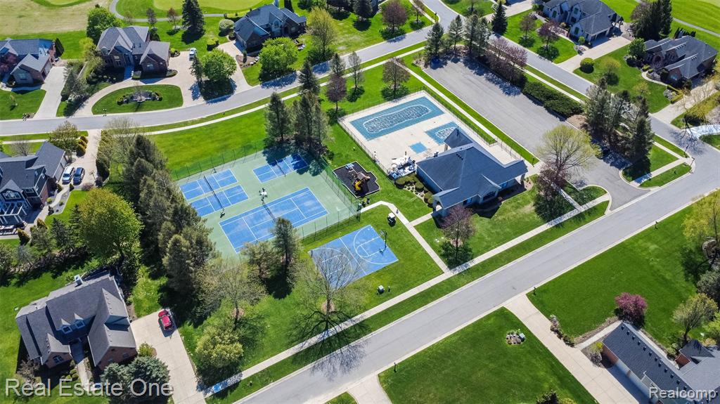 Aerial view of PVGC pool house, tennis, pickleball and basketball courts, and playground