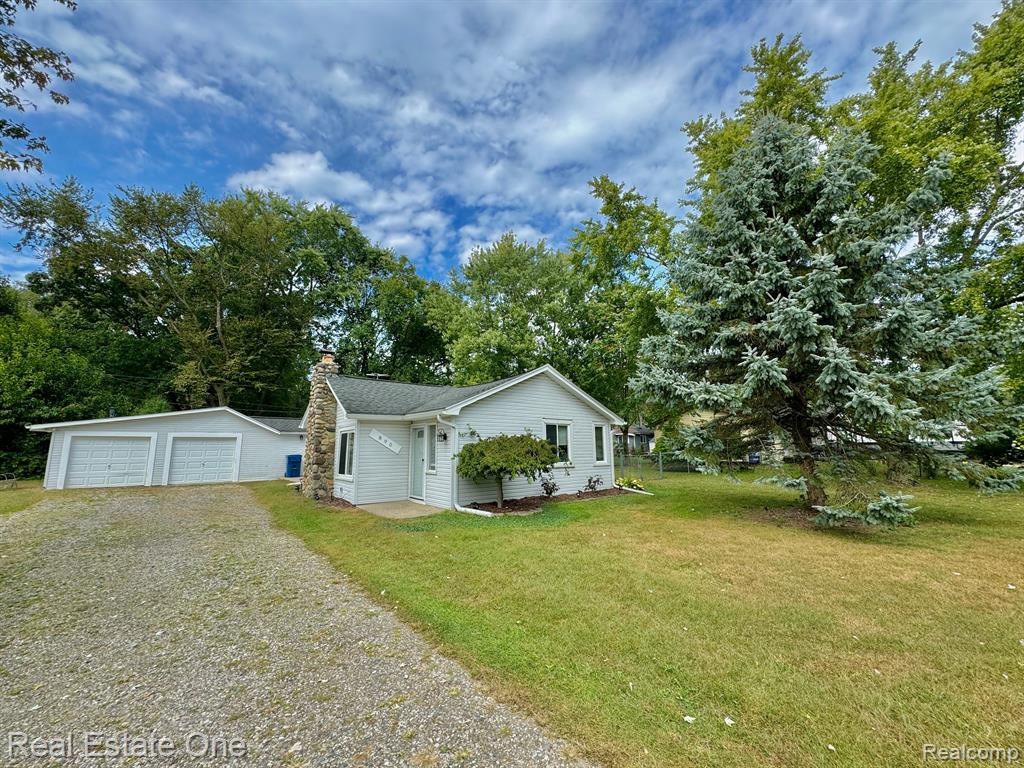 890 FARNSWORTH Road, White Lake, MI — front exterior