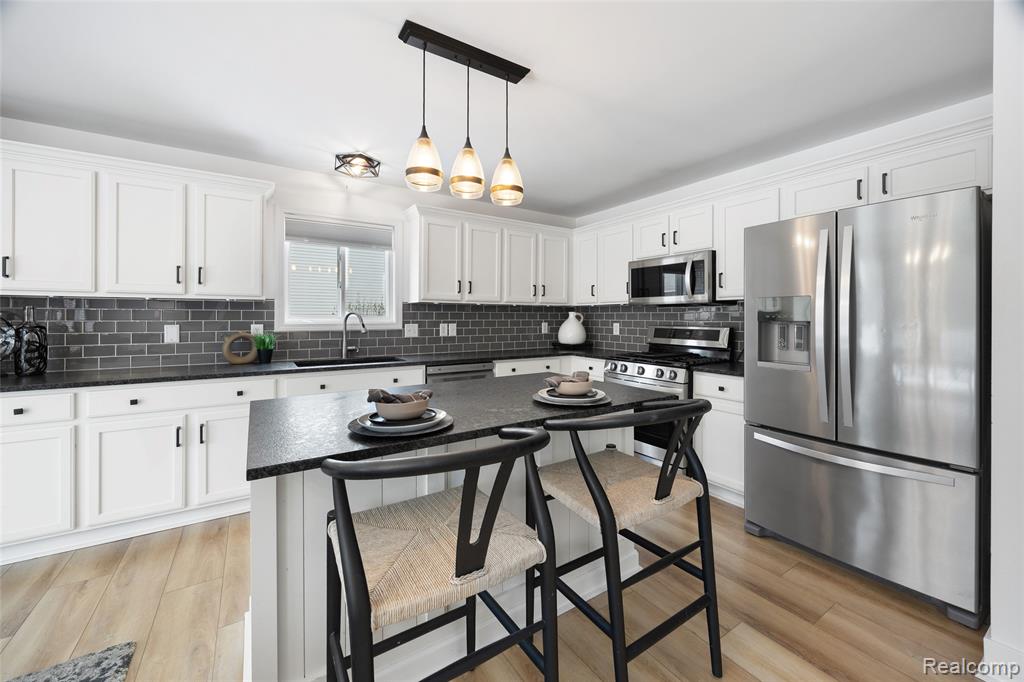 57351 Blossom Valley Trail, New Hudson, MI 48165 — Photo 10