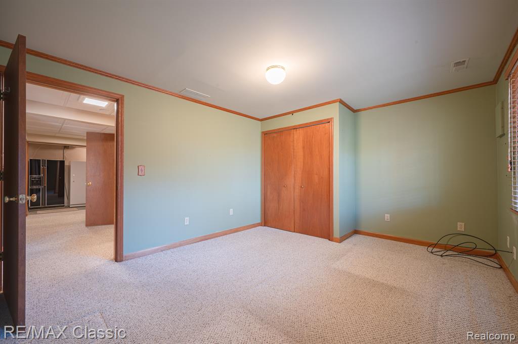 1049 ELMWOOD Drive, 13, Brighton, MI 48116 — Photo 31