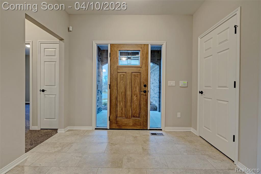 Entrance foyer with baseboards
