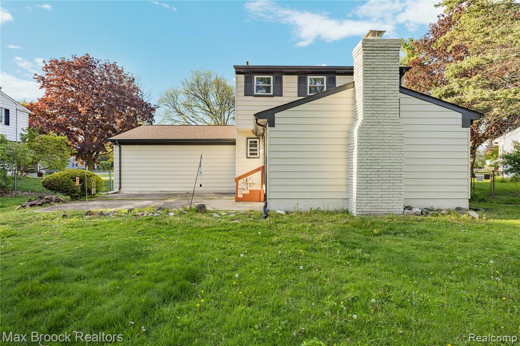 1874 Hopkins Drive, Wixom, MI 48393 — Photo 48