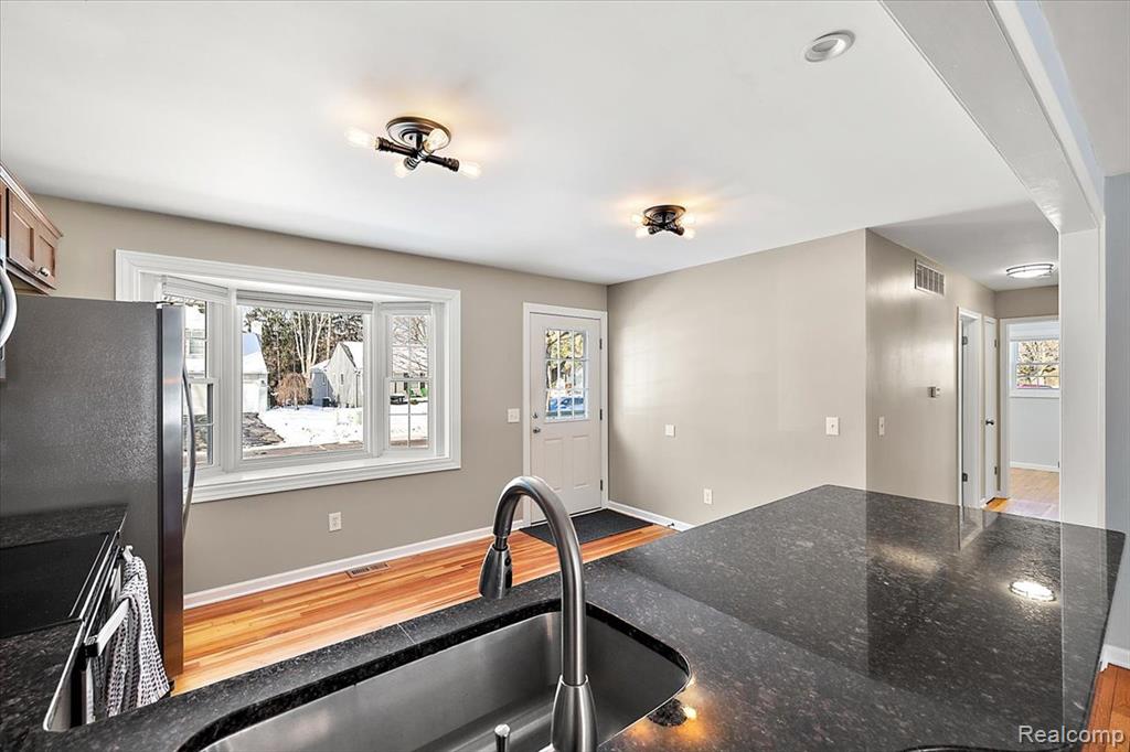2066 Teaneck Circle, Wixom, MI 48393 — Photo 20