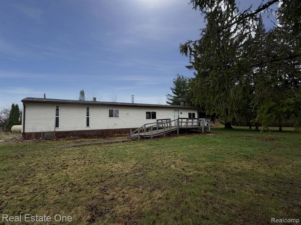 1653 E Pinconning Road, Pinconning, MI 48650 — front exterior