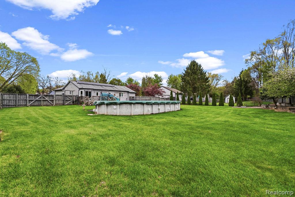 4713 Desert Bridge Court, Highland, MI 48356 — Photo 9