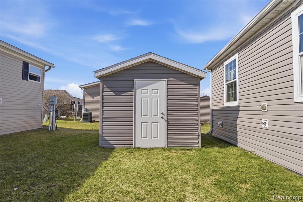 1935 Juneau Court, Hartland, MI 48353 — Photo 21