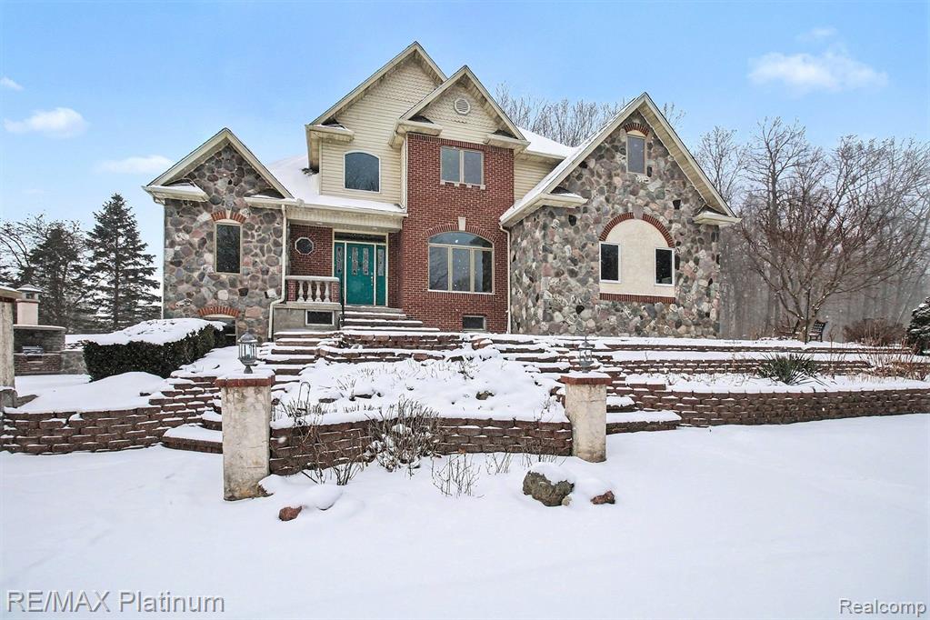 5245 FLEMING ROAD, Fowlerville, MI 48836 — front exterior