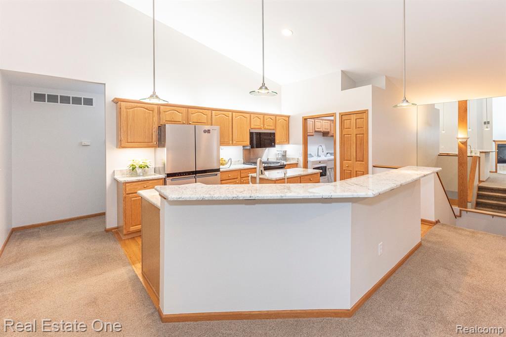61024 Evergreen Court, 23, South Lyon, MI 48178 — Photo 16
