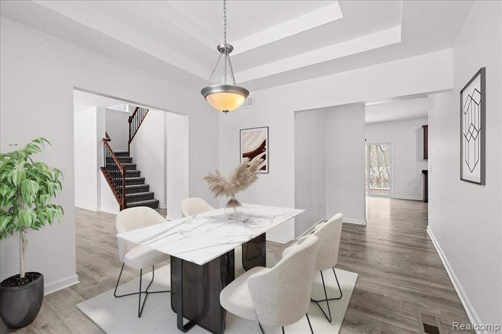 Foyer entrance featuring wood finished floors