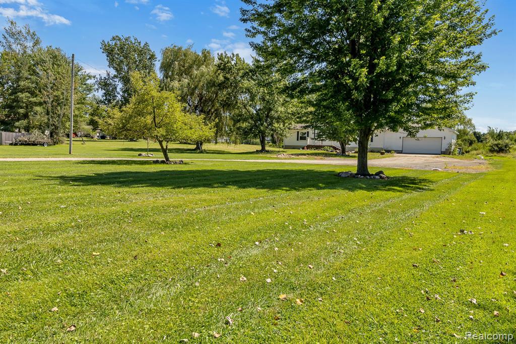 910 E MCARTHUR Street, Corunna, MI 48817 — Photo 4