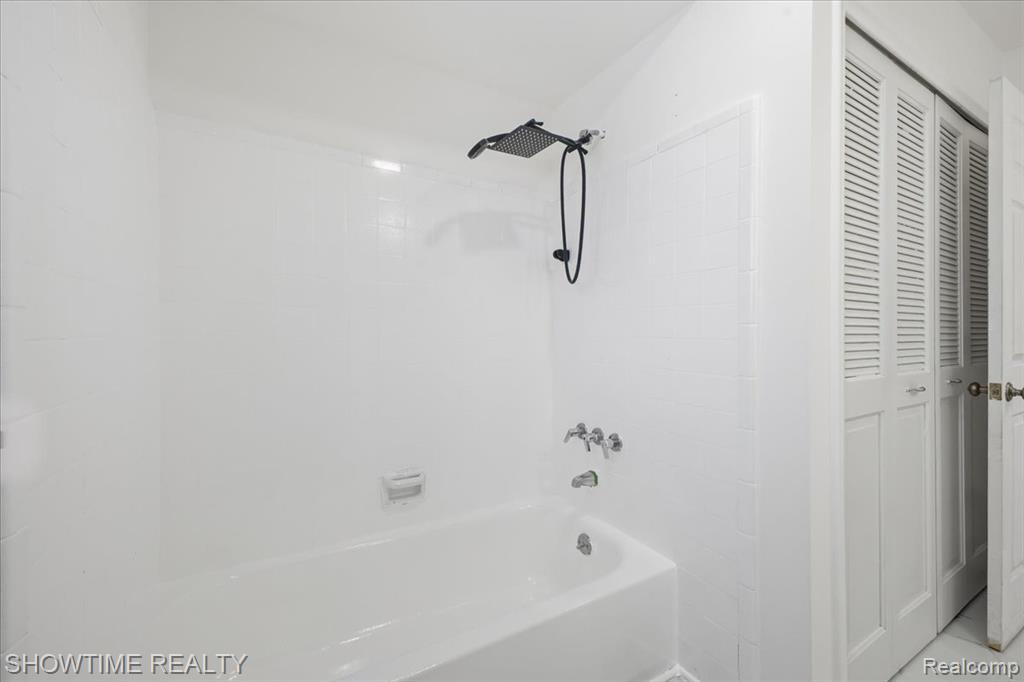 Bathroom featuring shower / bath combination
