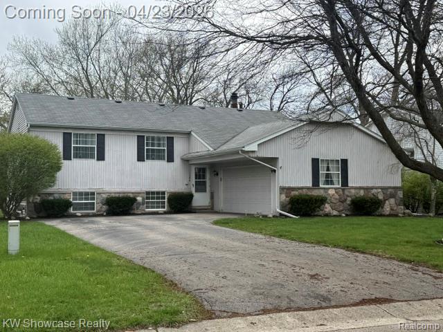 1584 Chanticlair Circle, Wixom, MI 48393 — front exterior