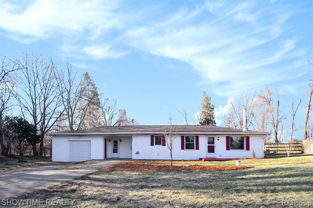 2055 SANDHILL Road, Mason, MI 48854 — front exterior